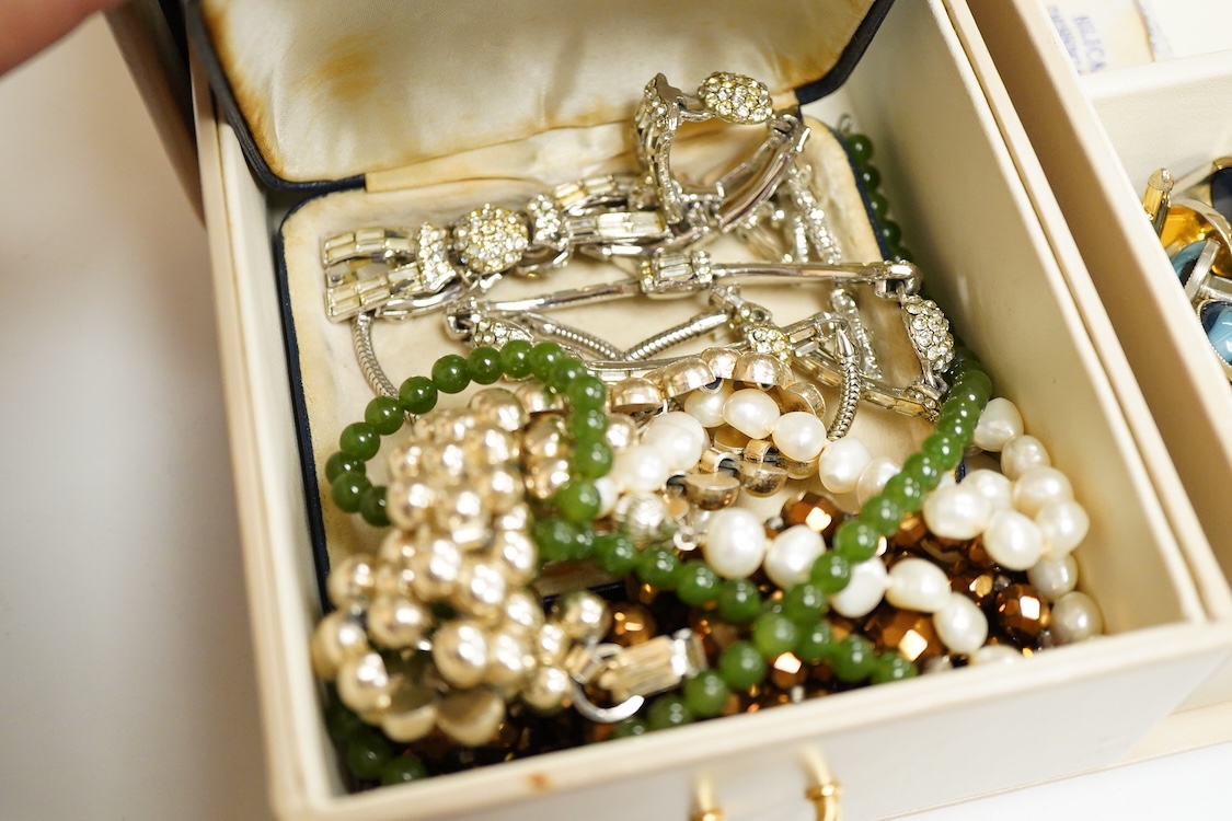 A jewellery box containing mainly costume and other jewellery including, silver and 925 cufflinks, a cultured pearl necklace with silver and paste set clasp and three wrist watches including a steel and gold plated Bulov